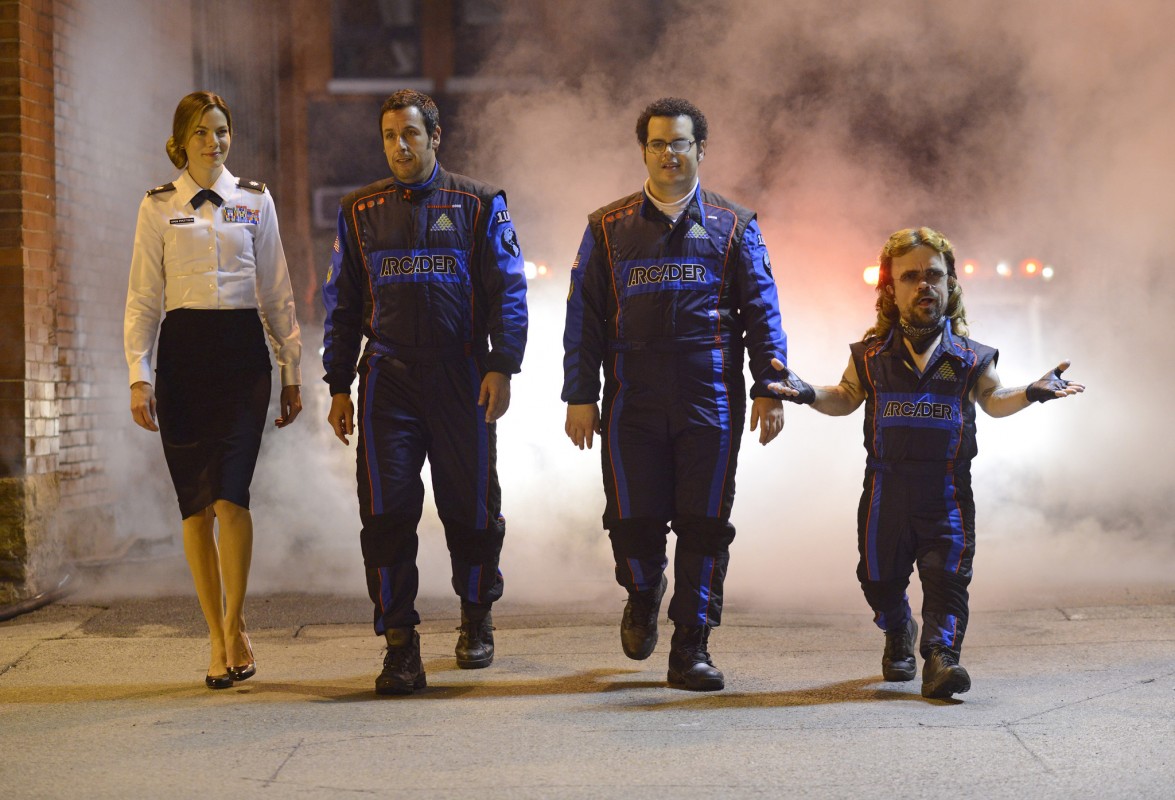 Violet Van Patten (Michelle Monaghan), Sam Brenner (Adam Sandler), Ludlow Lamonsoff (Josh Gad) and Eddie Plant (Peter Dinklage) in Columbia Pictures' PIXELS.